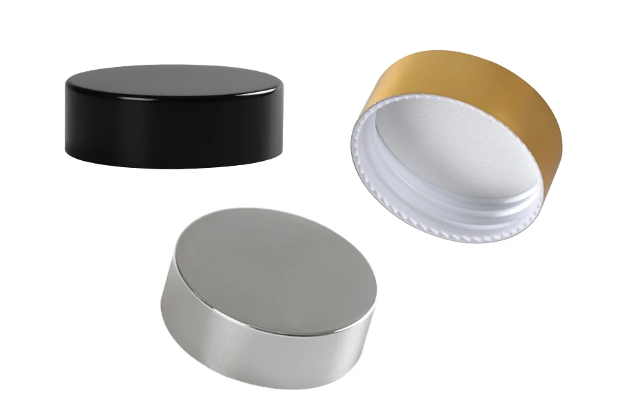 Kunststoffdeckel mit Aluminiumbeschichtung und Innendichtung für 50 ml Gläser Kunststoffdeckel mit Aluminiumbeschichtung und Innendichtung für 50 ml Gläser