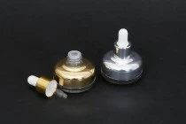 Μπουκαλάκι 20 ml γυάλινο με σταγονόμετρο και αποστραγγιστήρα Μπουκαλάκι 20 ml γυάλινο με σταγονόμετρο και αποστραγγιστήρα