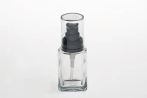 Μπουκαλάκι γυάλινο για κρέμα 30 ml με πλαστική μαύρη αντλία και διάφανο καπάκι