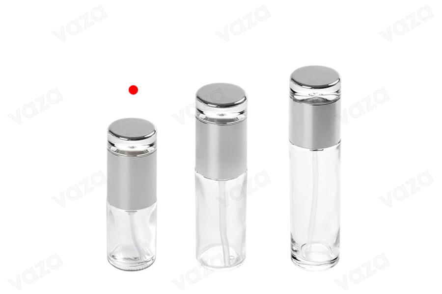 Flacon de 30ml en verre transparent avec pompe argentée et bouchon Flacon de 30ml en verre transparent avec pompe argentée et bouchon-photo_groupe