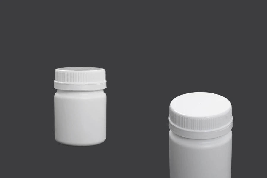 Flasche aus 100 ml Kunststoff mit weißem Deckel für pharmazeutische Produkte Flasche aus 100 ml Kunststoff mit weißem Deckel für pharmazeutische Produkte
