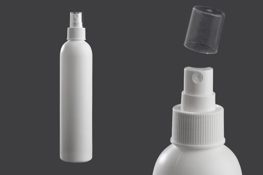 Bottiglia di plastica bianca da 300 ml con spray e tappo trasparente. Bottiglia di plastica bianca da 300 ml con spray e tappo trasparente.