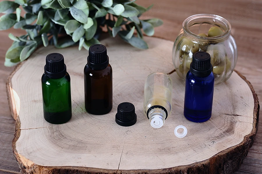 Petite bouteille en verre bleu pour huile d’olive de 30 ml-photo_groupe