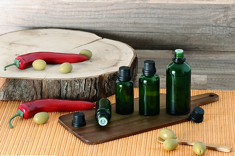 Petite bouteille en verre vert pour huile d’olive de 100 ml-