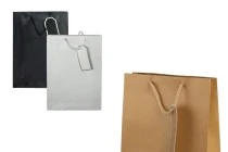 Paper gift bag with cotton handle in size 240x80x320 mm in different colours Paper gift bag with cotton handle in size 240x80x320 mm in different colours