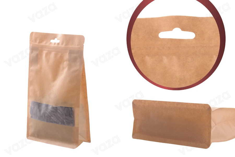 Qese kraft tip “Doy Pack”, me mbyllje “zip”, dritare dhe vrimë Eurohole, veshje të brendshme dhe të jashtme transparente dhe mundësi për vulosje me nxehtësi, 140x60x240 mm – 50 copë. Qese kraft tip “Doy Pack”, me mbyllje “zip”, dritare dhe vrimë Eurohole, veshje të brendshme dhe të jashtme transparente dhe mundësi për vulosje me nxehtësi, 140x60x240 mm – 50 copë.-imazh_grup