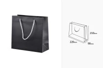 Black laminated gift bag with silver twisted rope handle in size 220x90x210 Black laminated gift bag with silver twisted rope handle in size 220x90x210