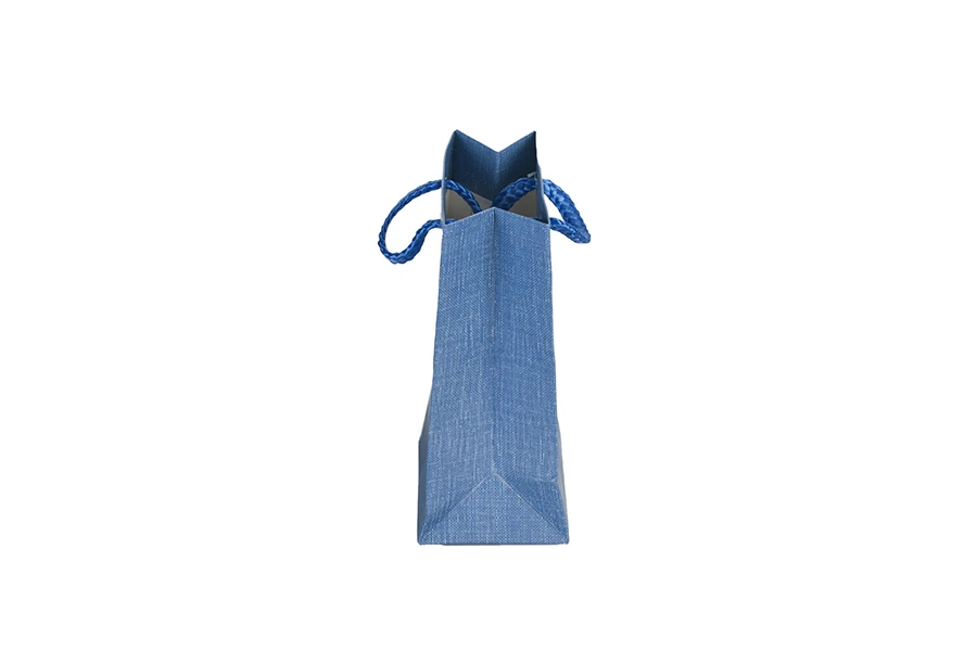 Paper gift bag with handle in many different colours in size 110x60x140 mm Paper gift bag with handle in many different colours in size 110x60x140 mm