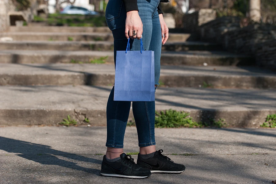 Paper gift bag with handle in different colours in size 180x100x250 mm Paper gift bag with handle in different colours in size 180x100x250 mm-image_group