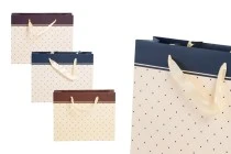 Paper gift bag with satin handle in different colours in size 250x80x200 mm Paper gift bag with satin handle in different colours in size 250x80x200 mm