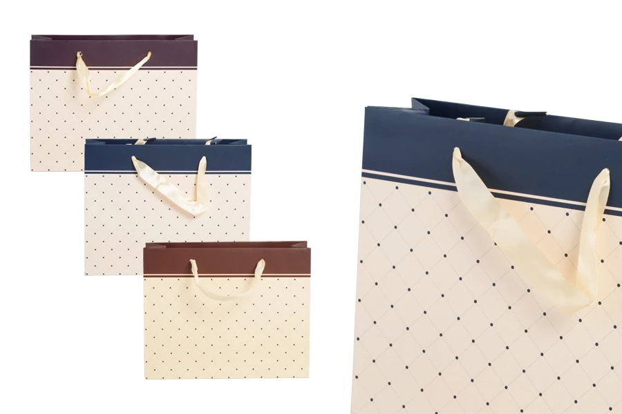 Paper gift bag with satin handle in different colours in size 250x80x200 mm Paper gift bag with satin handle in different colours in size 250x80x200 mm