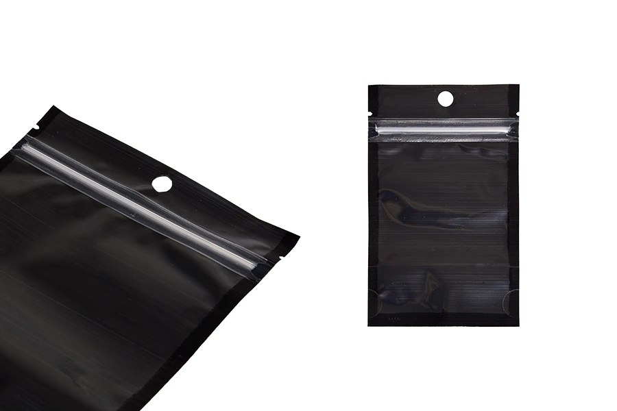 Σακουλάκια τύπου Doy Pack 80x30x130 mm αλουμινίου με μαύρη πίσω πλευρά, διάφανο μπροστά με κλείσιμο "zip" και δυνατότητα σφράγισης με θερμοκόλληση - 100 τμχ