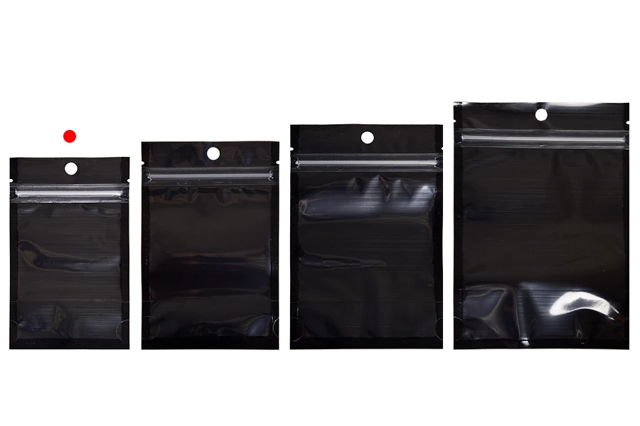 Σακουλάκια τύπου Doy Pack 80x30x130 mm αλουμινίου με μαύρη πίσω πλευρά, διάφανο μπροστά με κλείσιμο "zip" και δυνατότητα σφράγισης με θερμοκόλληση - 100 τμχ