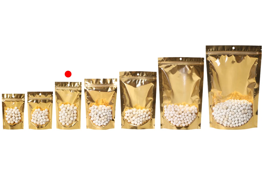 Σακουλάκια τύπου Doy Pack 100x30x180 mm αλουμινίου με χρυσή πίσω πλευρά, διάφανο μπροστά με κλείσιμο "zip" και δυνατότητα σφράγισης με θερμοκόλληση - 100 τμχ