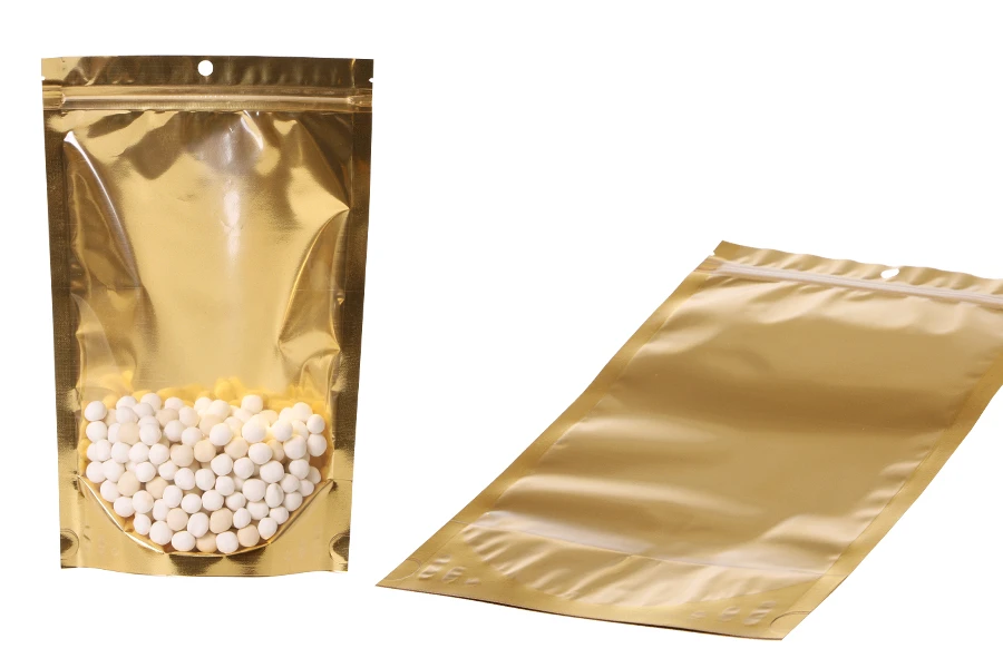 Σακουλάκια τύπου Doy Pack 180x50x280 mm αλουμινίου με χρυσή πίσω πλευρά, διάφανο μπροστά με κλείσιμο "zip" και δυνατότητα σφράγισης με θερμοκόλληση - 100 τμχ