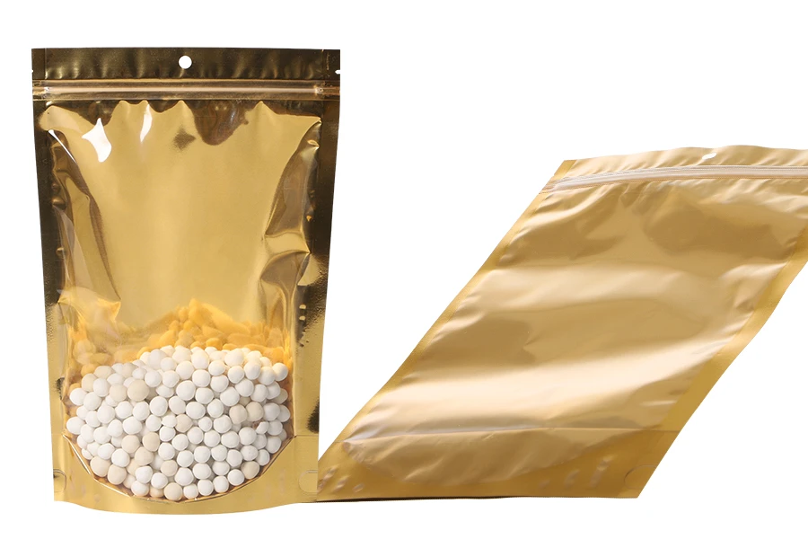 Σακουλάκια τύπου Doy Pack 200x50x300 mm αλουμινίου με χρυσή πίσω πλευρά, διάφανο μπροστά με κλείσιμο "zip" και δυνατότητα σφράγισης με θερμοκόλληση - 100 τμχ Σακουλάκια τύπου Doy Pack 200x50x300 mm αλουμινίου με χρυσή πίσω πλευρά, διάφανο μπροστά με κλείσιμο "zip" και δυνατότητα σφράγισης με θερμοκόλληση - 100 τμχ