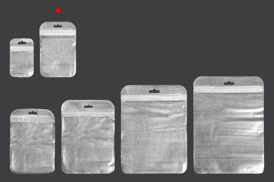 Σακουλάκια με κλείσιμο zip 85x130 mm, non woven ασημί πίσω όψη, διάφανο μπροστά και τρύπα eurohole - 100 τμχ