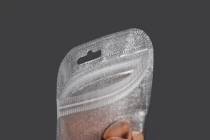 Σακουλάκια με κλείσιμο zip 122x170 mm, non woven ασημί πίσω όψη, διάφανο μπροστά και τρύπα eurohole - 100 τμχ