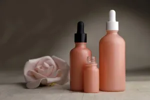 Flacon en verre pour huiles essentielles de 30 ml rose MAT avec bouche PP18-3