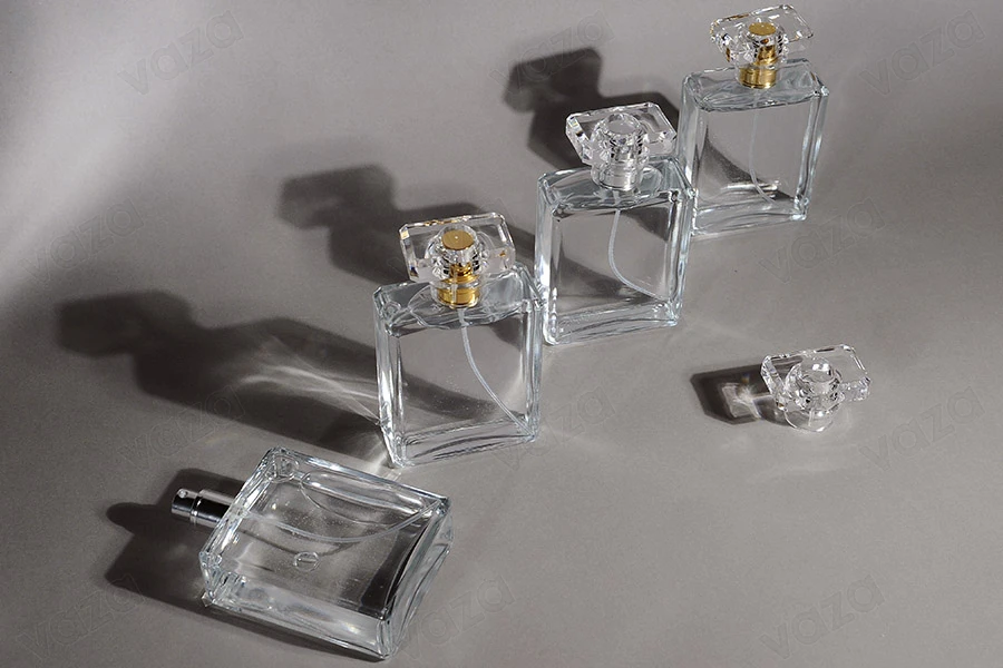 Shishe parfumi prej qelqi 100 ml transparente me sprej dhe kapak Shishe parfumi prej qelqi 100 ml transparente me sprej dhe kapak-imazh_grup