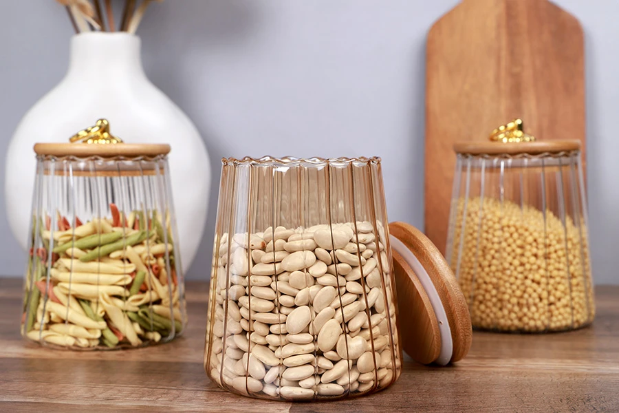 Βάζο γυάλινο 600 ml μπρονζέ με ξύλινο καπάκι, λάστιχο και χρυσό μεταλλικό κρίκο