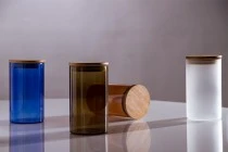 Βαζάκι γυάλινο 85x150 mm με ξύλινο καπάκι και λάστιχο Βαζάκι γυάλινο 85x150 mm με ξύλινο καπάκι και λάστιχο