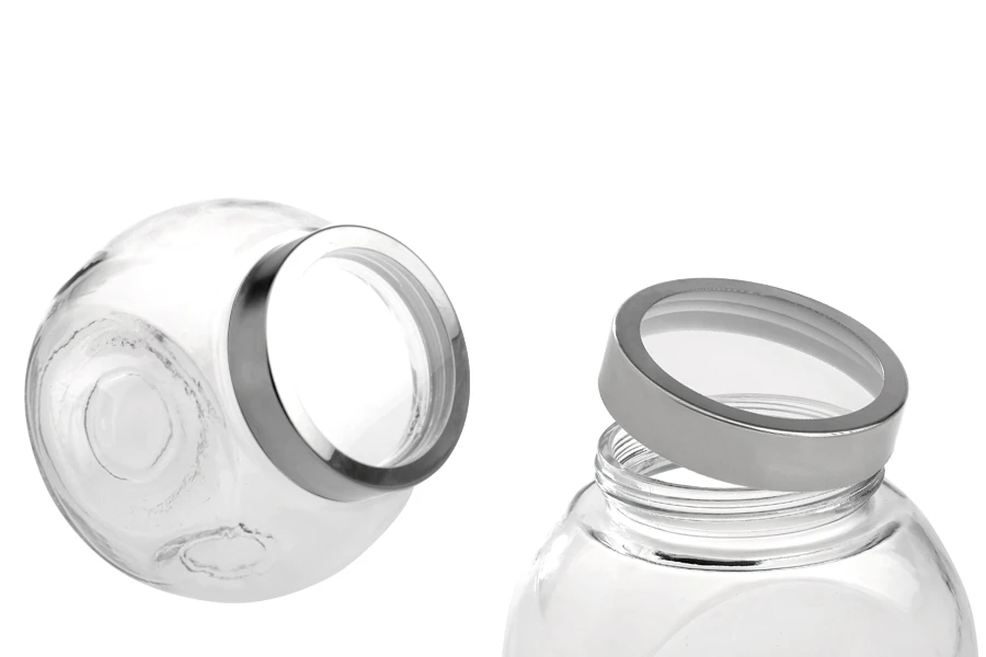 Βάζο 2000 ml γυάλινο που πλαγιάζει με δύο βάσεις και ασημί-διάφανο, πλαστικό καπάκι Βάζο 2000 ml γυάλινο που πλαγιάζει με δύο βάσεις και ασημί-διάφανο, πλαστικό καπάκι