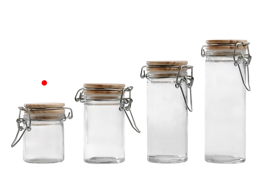 Βάζο 40 ml γυάλινο στρογγυλό 64x45 mm με ξύλινο καπάκι και αεροστεγές κλείσιμο (σύρμα και λάστιχο στο καπάκι)