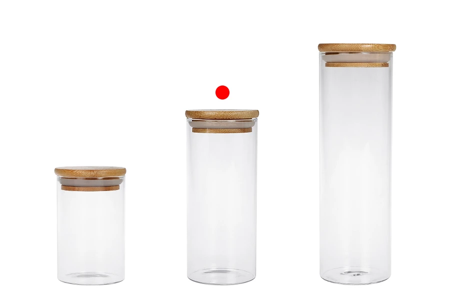 Βαζάκι γυάλινο 400 ml, στρογγυλό με ξύλινο καπάκι και λάστιχο Βαζάκι γυάλινο 400 ml, στρογγυλό με ξύλινο καπάκι και λάστιχο