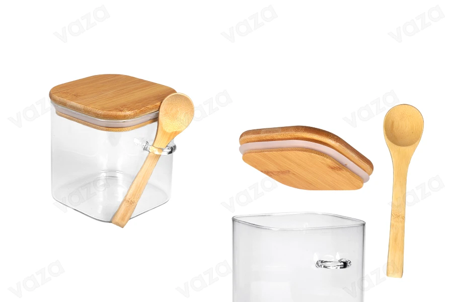 Barattolo in vetro da 700 ml, quadrato 100x100 mm con cucchiaio e tappo in legno Barattolo in vetro da 700 ml, quadrato 100x100 mm con cucchiaio e tappo in legno-immagine_prodotto