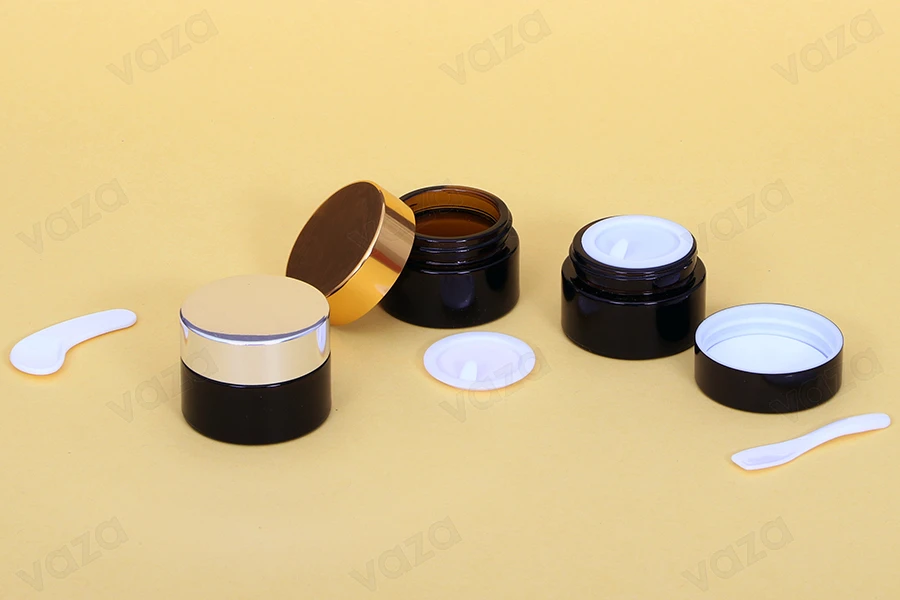 Kavanozë 15 ml ngjyrë karamele, prej qelqi me tapë plastike në kavanoz dhe mbulesë-mbrojtëse brenda kapakut Kavanozë 15 ml ngjyrë karamele, prej qelqi me tapë plastike në kavanoz dhe mbulesë-mbrojtëse brenda kapakut -imazh_grup