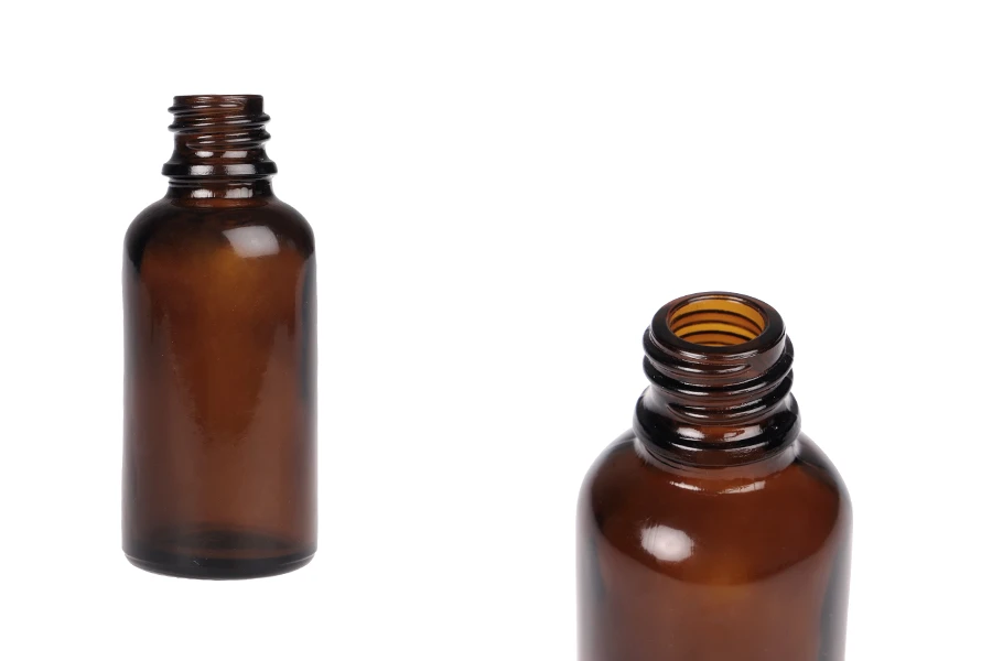 Flaconcino di vetro ambrato da 30 ml per oli essenziali con beccuccio PP18 Flaconcino di vetro ambrato da 30 ml per oli essenziali con beccuccio PP18