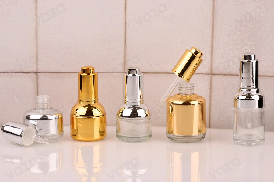 Kosmetikflasche 30ml aus Glas mit Pipette, Abfluss und Knopfdeckel Kosmetikflasche 30ml aus Glas mit Pipette, Abfluss und Knopfdeckel-bildgruppe