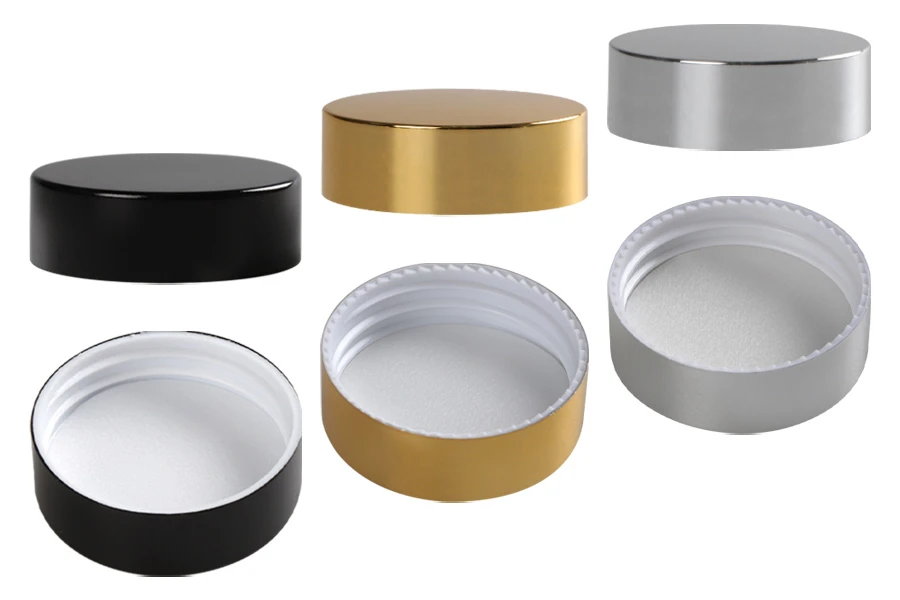 Kunststoffdeckel mit Aluminiumbeschichtung und Innendichtung für 30 ml Gläser Kunststoffdeckel mit Aluminiumbeschichtung und Innendichtung für 30 ml Gläser