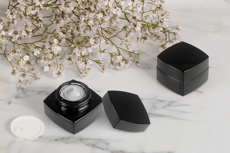 Barattolo di vetro quadrato di lusso da 20 ml di colore nero per crema con coperchio e sigillo in plastica Barattolo di vetro quadrato di lusso da 20 ml di colore nero per crema con coperchio e sigillo in plastica
