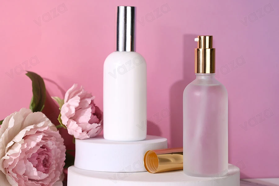 Aluminum cream pump with nozzle and PP18 finish, available in different colors.-image_group