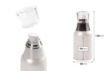 Bottiglia airless da 50 ml con pompetta per crema e tappo trasparente.