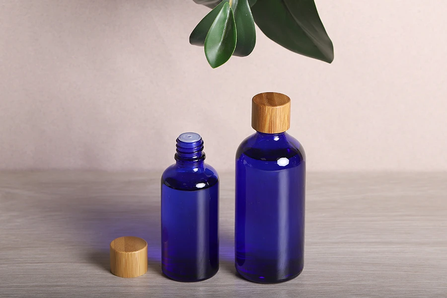 Καπάκι πλαστικό PP18 με επικάλυψη bamboo, εσωτερικό liner και πλαστική τάπα με κάλυμμα Καπάκι πλαστικό PP18 με επικάλυψη bamboo, εσωτερικό liner και πλαστική τάπα με κάλυμμα