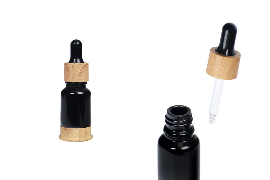 Μπουκαλάκι γυάλινο 10 ml μαύρο με πλαστικό σταγονομετρητή και βάση σε σχέδιο ξύλου Μπουκαλάκι γυάλινο 10 ml μαύρο με πλαστικό σταγονομετρητή και βάση σε σχέδιο ξύλου