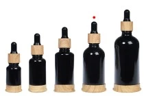 Μπουκαλάκι γυάλινο 50 ml μαύρο με πλαστικό σταγονομετρητή και βάση σε σχέδιο ξύλου Μπουκαλάκι γυάλινο 50 ml μαύρο με πλαστικό σταγονομετρητή και βάση σε σχέδιο ξύλου