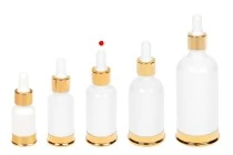 Μπουκαλάκι γυάλινο 30 ml λευκό με σταγονομετρητή και χρυσή βάση αλουμινίου Μπουκαλάκι γυάλινο 30 ml λευκό με σταγονομετρητή και χρυσή βάση αλουμινίου