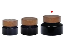 Glasdose für Creme 100ml in schwarzer Farbe mit Holzdeckel und Kunststoffverschluss