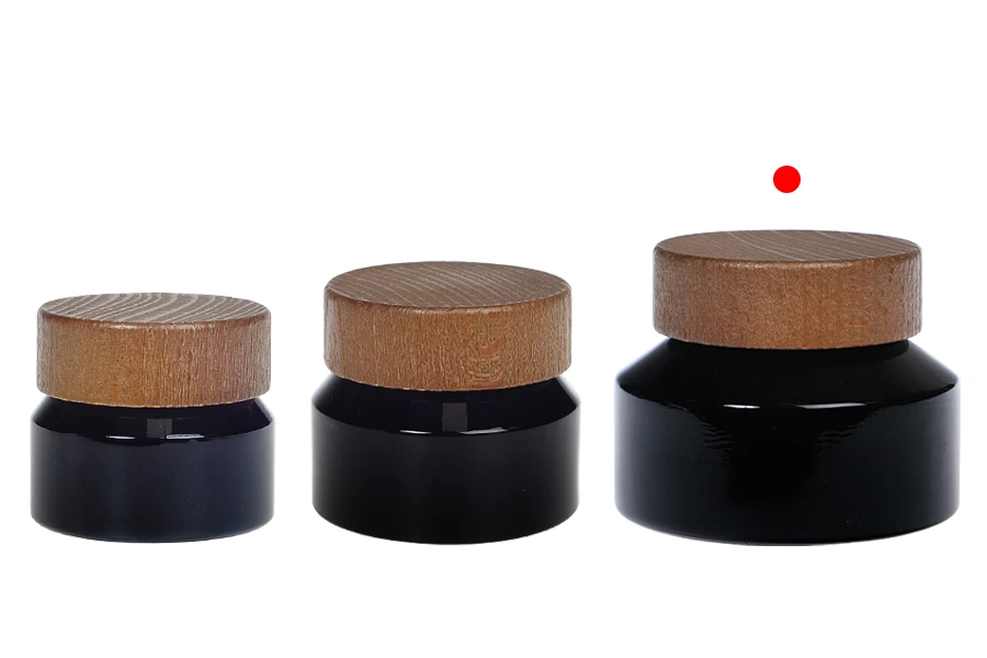 Glasdose für Creme 100ml in schwarzer Farbe mit Holzdeckel und Kunststoffverschluss