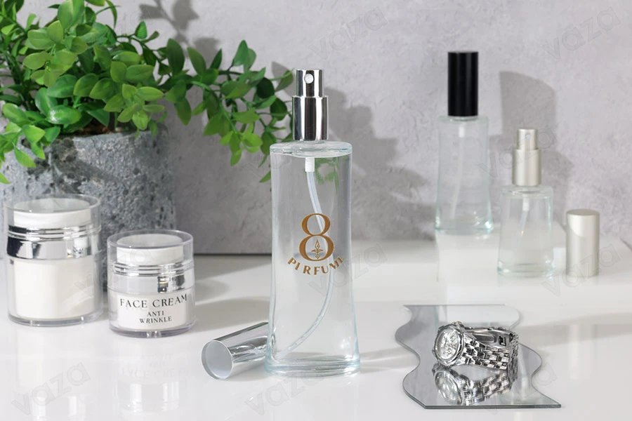 Flacon de parfum en verre ovale de 100 ml (18/415) Flacon de parfum en verre ovale de 100 ml (18/415)-photo_groupe