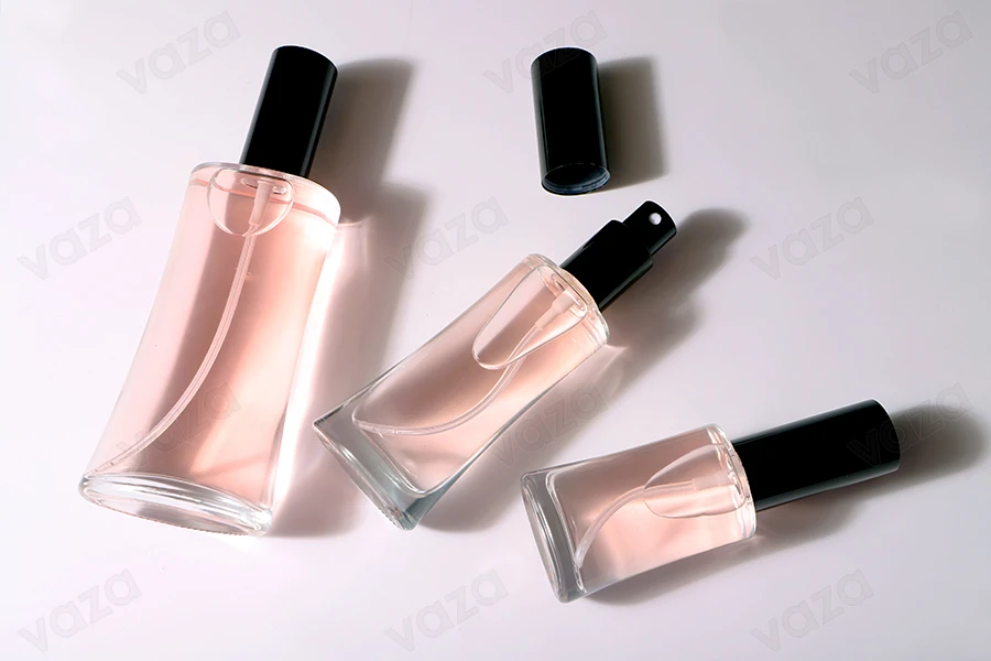 Flacon de parfum en verre ovale de 100 ml (18/415) Flacon de parfum en verre ovale de 100 ml (18/415)-photo_groupe