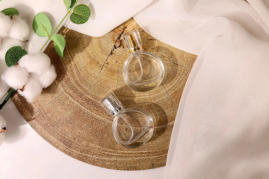 Transparent 25ml perfume glass bottle with spray pump and transparent cap Transparent 25ml perfume glass bottle with spray pump and transparent cap