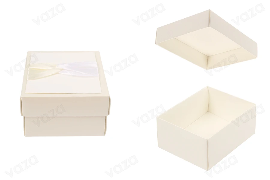 Boîte en papier blanc avec nœud beige et satin Boîte en papier blanc avec nœud beige et satin-εικόνα_προϊοντική