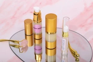 15ml airless cream bottle with transparent plastic body and gold matte cap and bottom-3