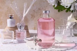 Flacon de parfum 500 ml, en verre, cylindrique, avec porte robinet (choisir le robinet parmi les accessoires)*.-5