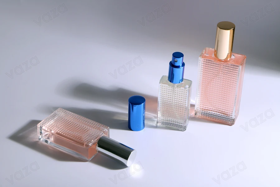 Bottiglia di vetro sagomato per profumi da 90 ml (18/415). Bottiglia di vetro sagomato per profumi da 90 ml (18/415).-gruppo_immagini